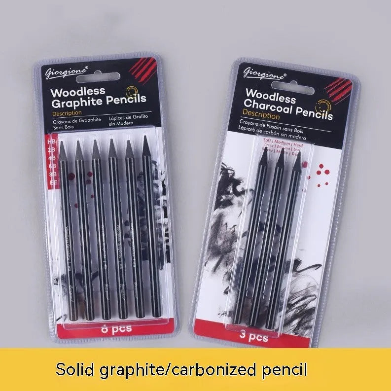 Set of nine graphite and carbonised drawing pencils in wooden casings on a suction card.