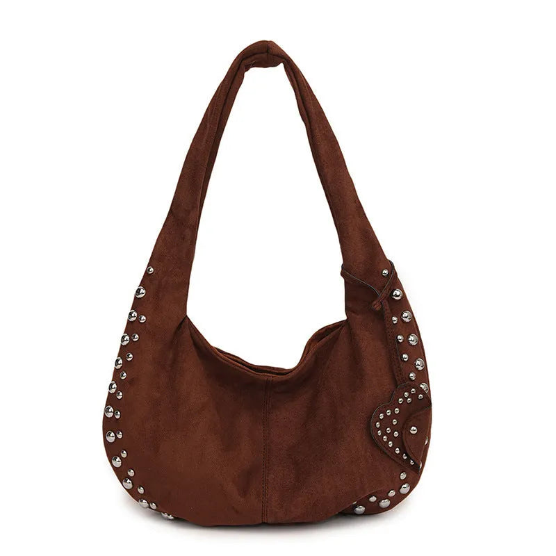 Soft plush retro tote handbag shown in black colour with strapless underarm carry design