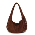 Soft plush retro tote handbag shown in black colour with strapless underarm carry design