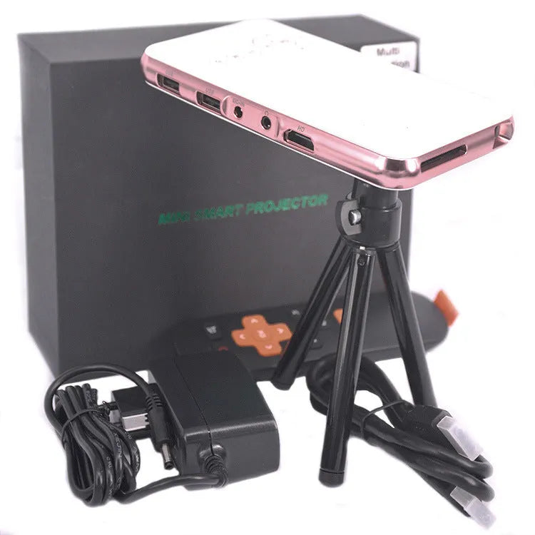 White and rose gold M6S miniature portable Android DLP smart projector on a table.
