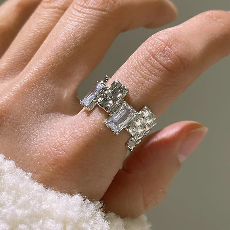 Geometric silver zircon ring with open design and three-dimensional retro decorations