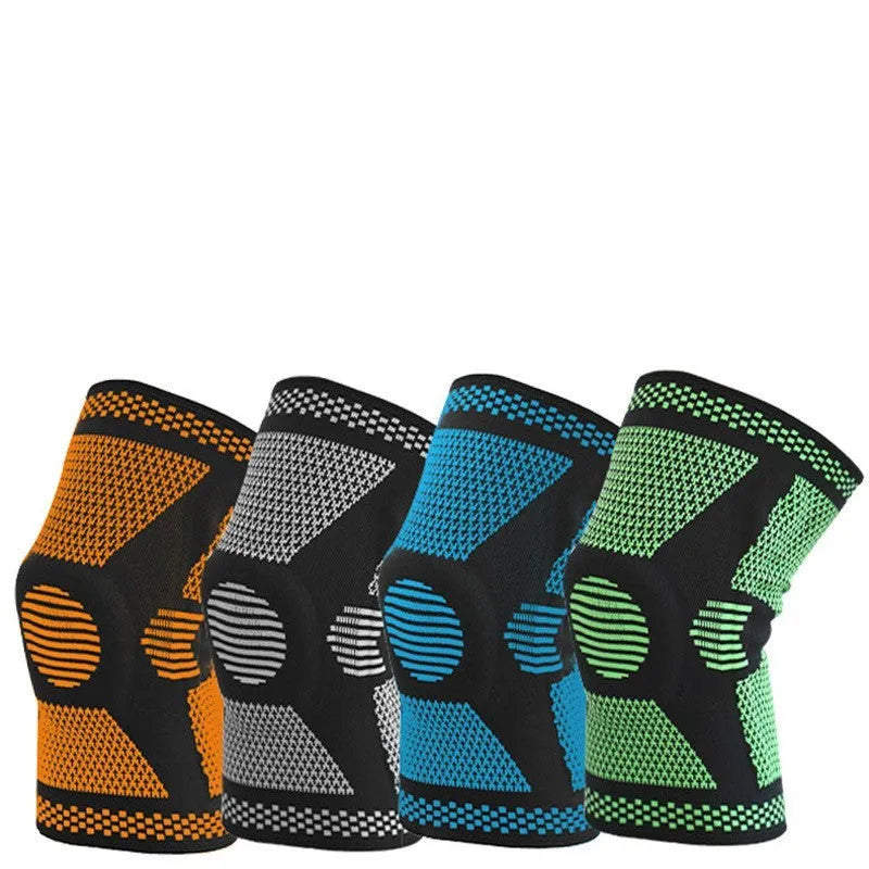 Blue sports knee pad with a visible silicone spring circle on a polyamide sleeve.