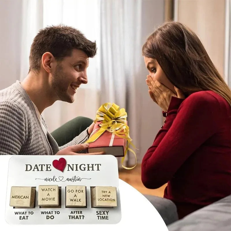 Wooden date night dice set with five natural wood dice on a rectangular planner board next to a black storage bag.