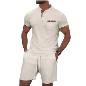Man wearing a grey waffle-textured zip polo short sleeve top and matching shorts from a two-piece suit set.