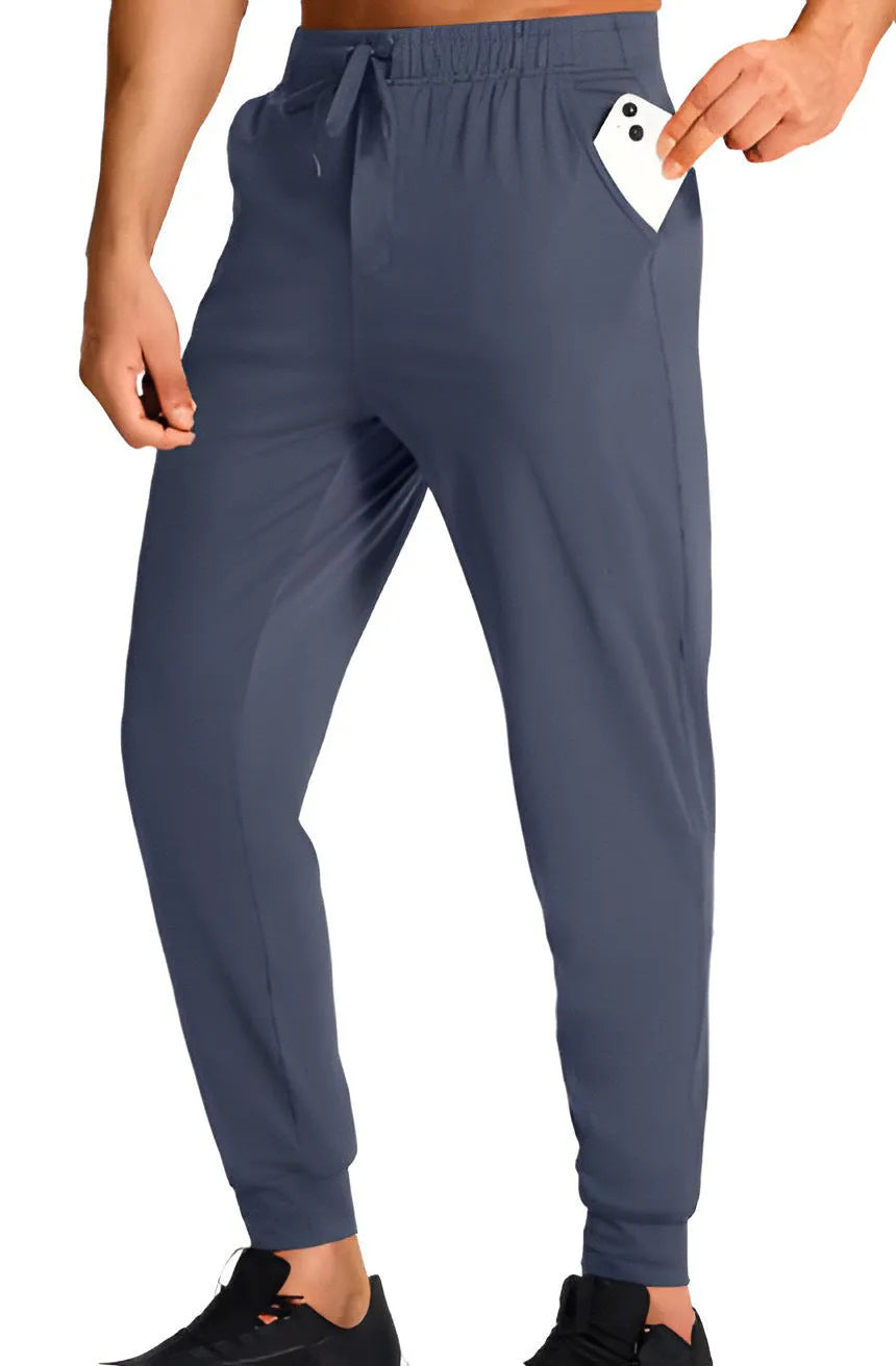 Men's loose fit casual polyester trousers in solid colour available in multiple sizes