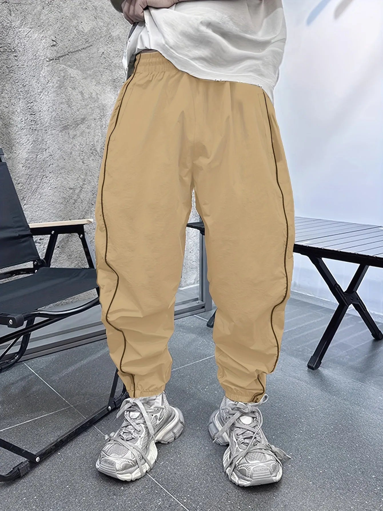 Men's loose fit casual sports trousers in bamboo fibre, shown in cropped length and a colour option like blue.
