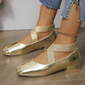 Gold French evening style slip-on pumps with a skirted collar and square toe on a white background.