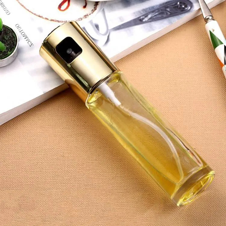 ABS and glass oil spray bottle with pump mechanism in gold, rose gold or silver colour