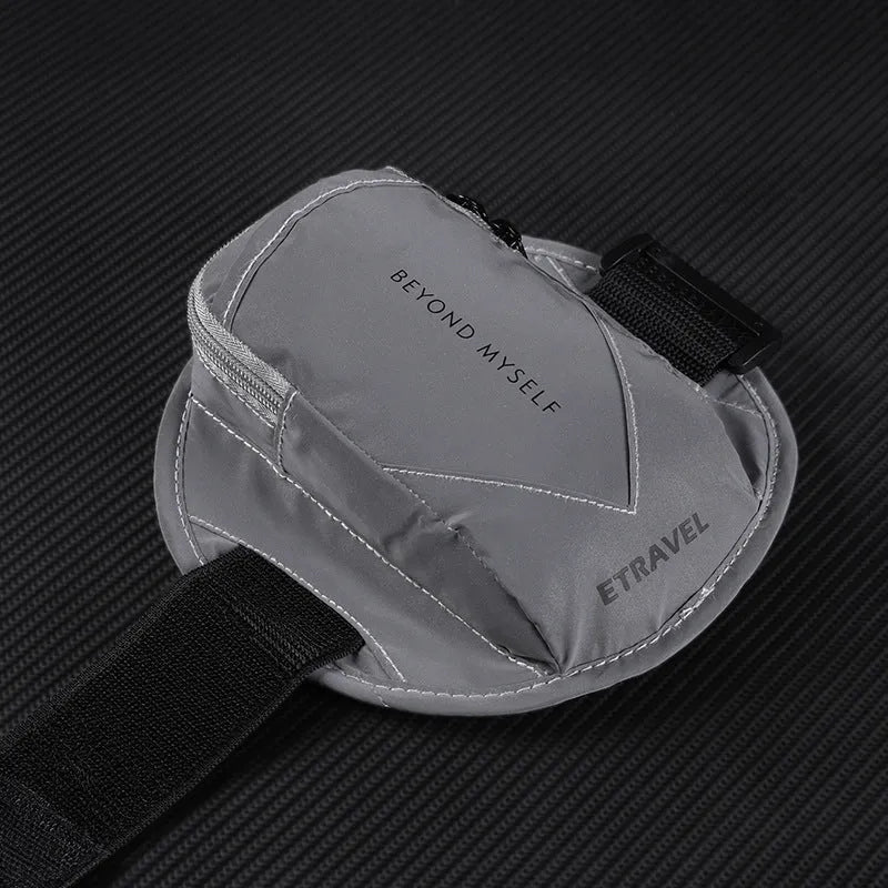 Lightweight reflective running arm bag in black, yellow, or grey, shown on an arm.