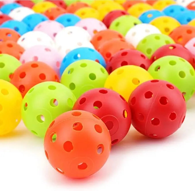 Multi-colour golf practice balls in red, orange, blue, green, white, and yellow, shown in a net pocket.