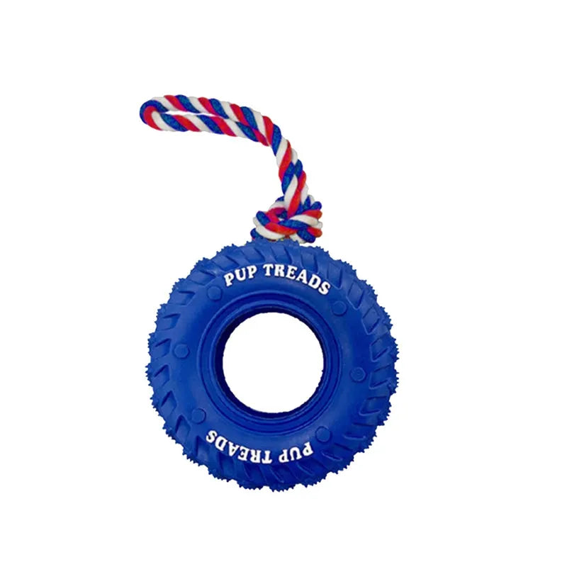 Rubber tire dog chew toy with cotton rope handle for tug of war and treat dispensing, in black, blue, or orange