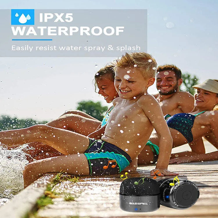 Black mini portable waterproof Bluetooth speaker with control buttons.