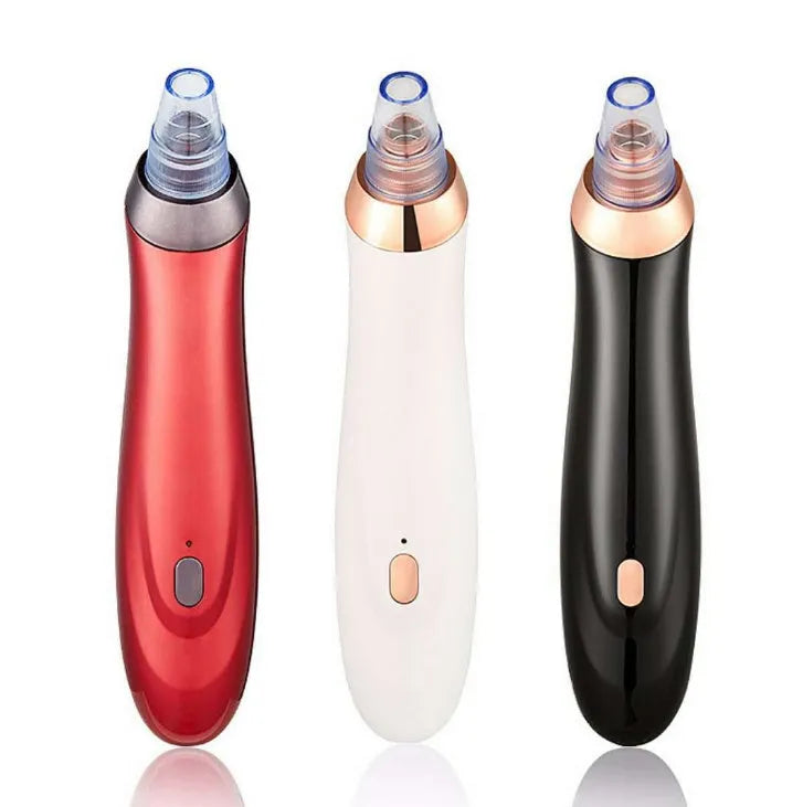 Electric blackhead remover pore cleaner tool with multiple nozzles on a white background.