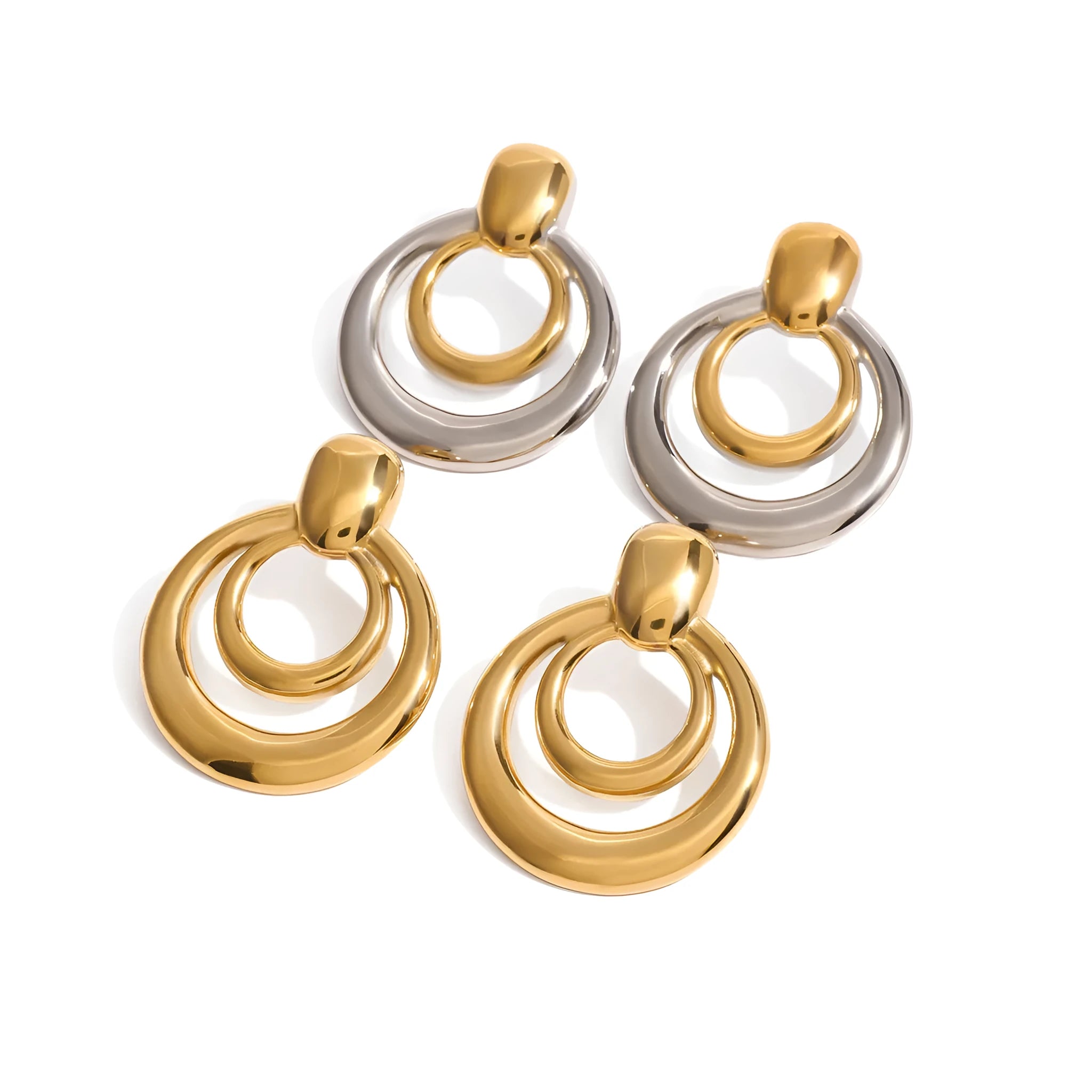 Golden round geometric stud earrings with hollow double layer design on white background