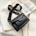 Vintage-style black PU crossbody bag with adjustable strap showing interior