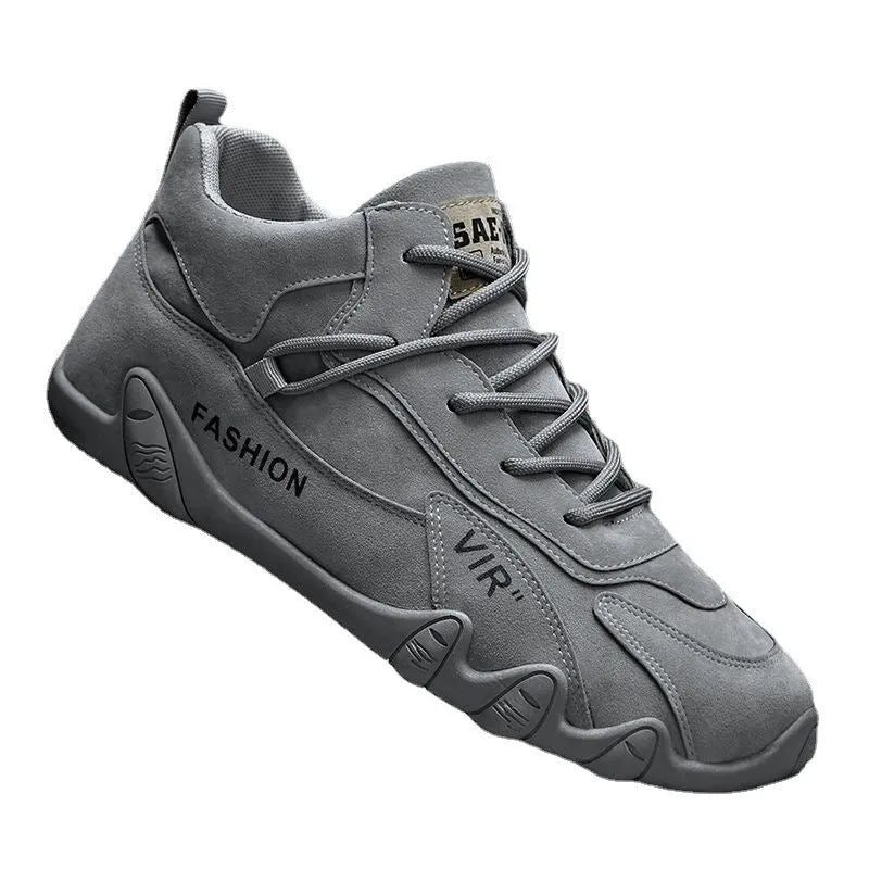 Men's grey low-cut slip-on work shoes with non-slip sole and elastic band.
