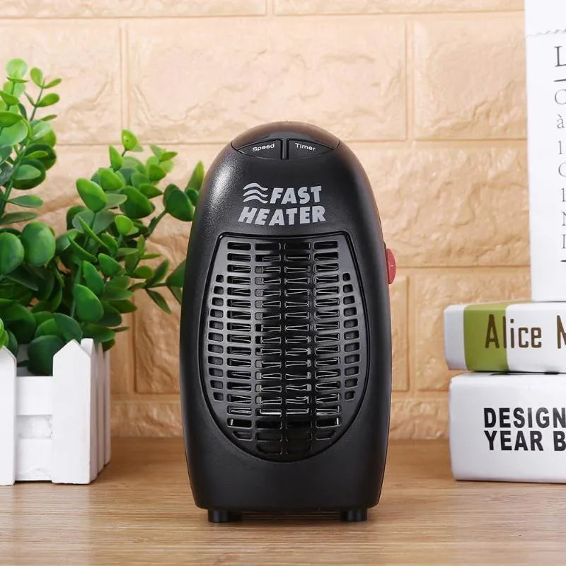 Black compact ceramic mini electric heater with digital display and a rotating three-prong plug.