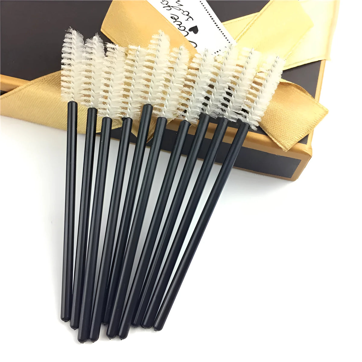 Disposable eyelash curler comb in black, blue, pink, rose red, white, and yellow colours, 10cm length