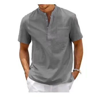 Men's solid colour short sleeve polo shirt with a stand collar, shown in a loose fit.