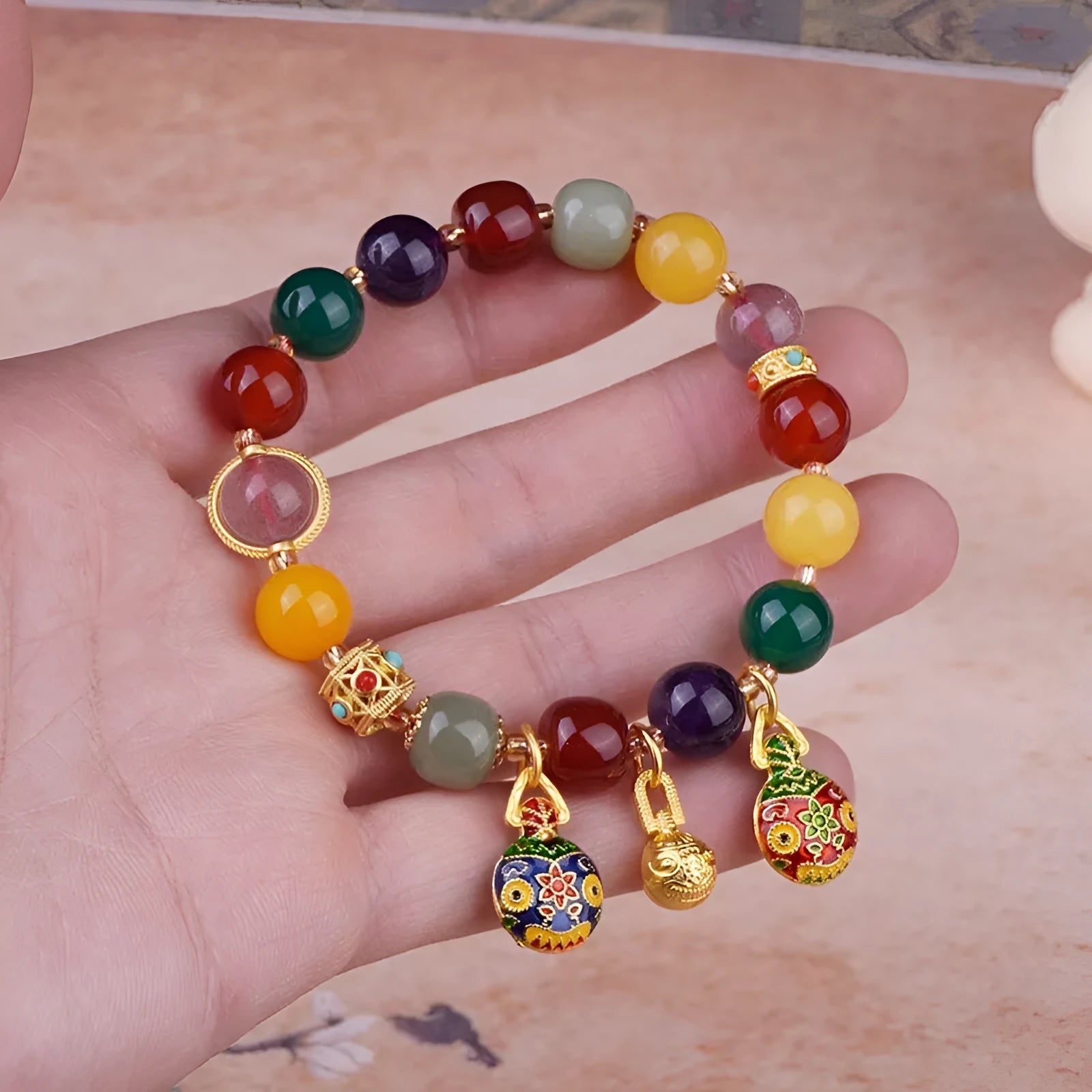 Swallowing Gold Beast agate bracelet with 10mm beads and hand-woven construction
