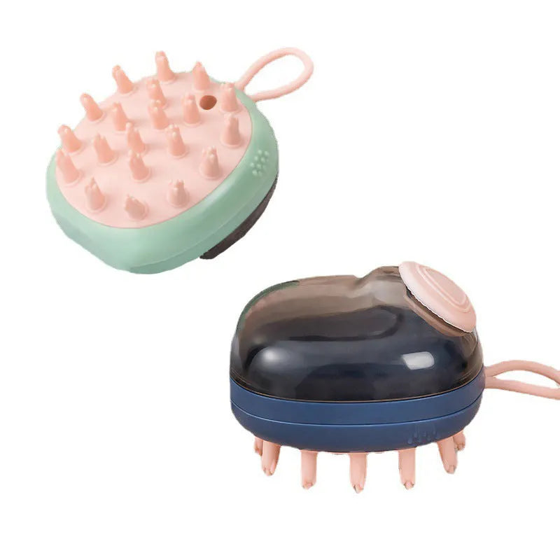 Blue 2-in-1 pet bathing brush with silicone head and integrated shampoo dispenser held in a hand.