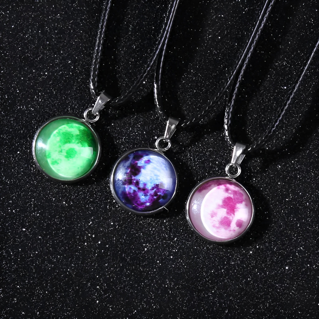 Luminous alloy necklace with a constellation-modelled glass pendant on an adjustable chain.