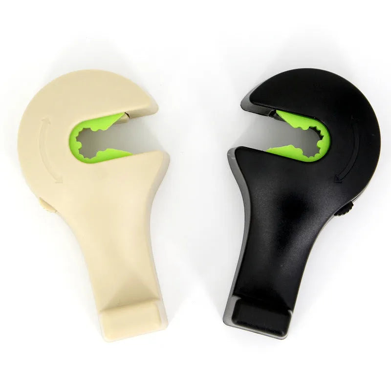Creative car seat hook in black, made of ABS and silicone, holding a bag with 10KG capacity, pack of 2