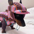 Dirty pink striped polyester dog vest and matching hat set for small to medium dogs.