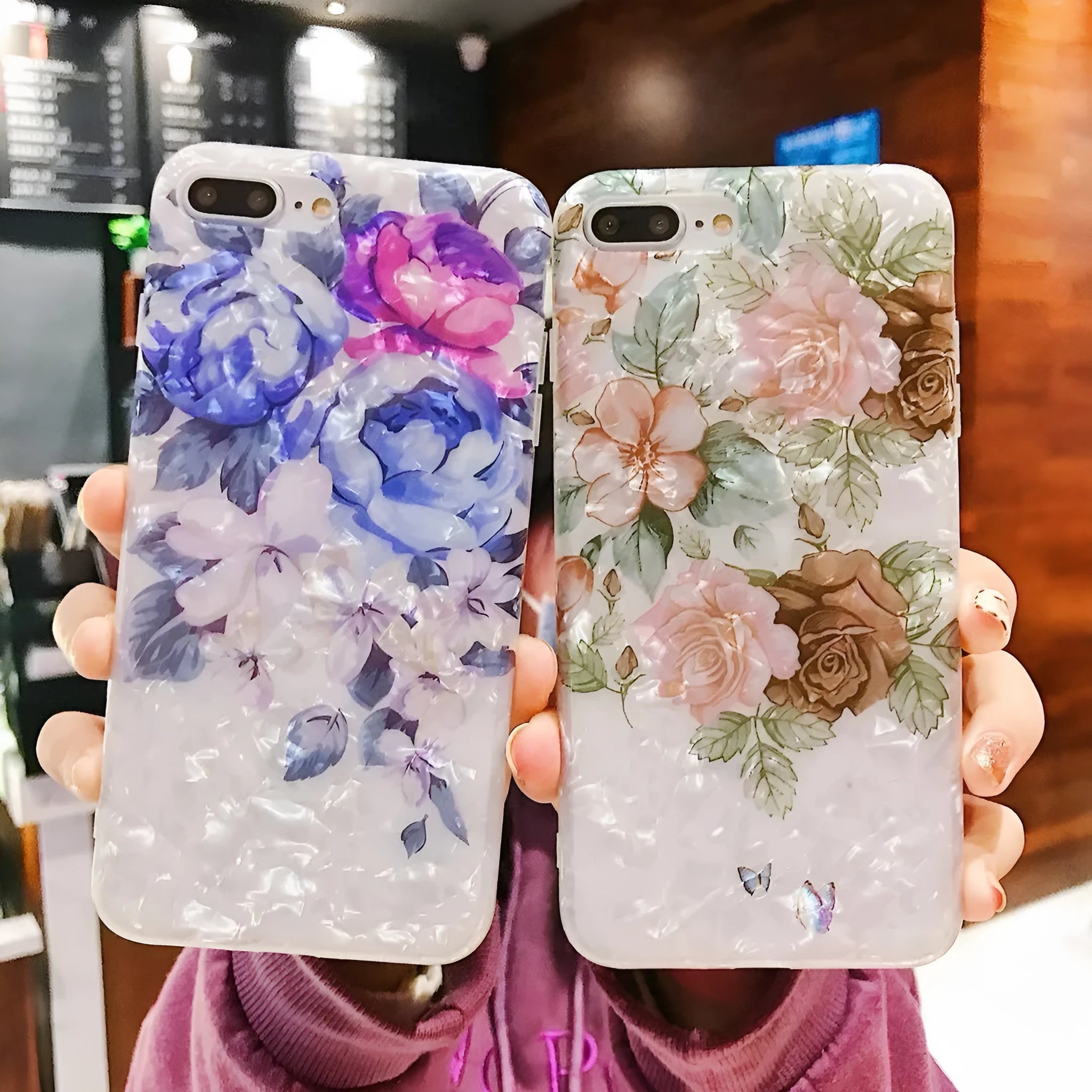 Dream Shell soft TPU iPhone case with rose flower design in purple, shown on a phone.