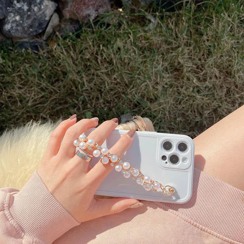 Rhinestone pearl bracelet silicone phone case for iPhone, pink and white colours, decorative design