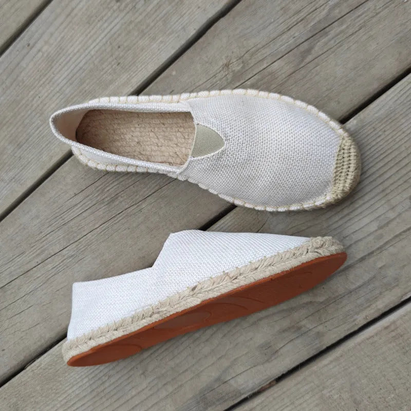 Men's solid colour canvas casual shoes with round toe in light brown.