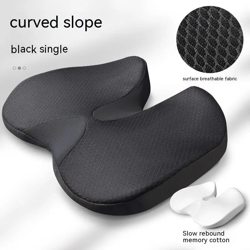 Curved bevel design seat cushion for tailbone support in beige colour on a chair