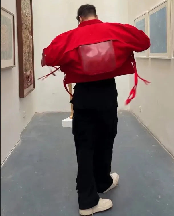 Men's red short jacket with zip front on model