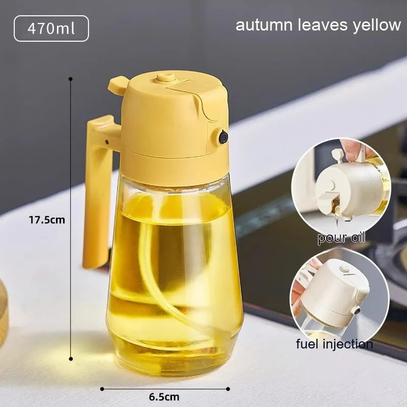 Glass olive oil sprayer bottle with ergonomic handle in beige, showing spray and pour functions.