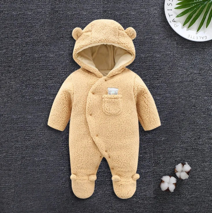 Brown cotton baby winter jumpsuit with covered feet and a front zipper.