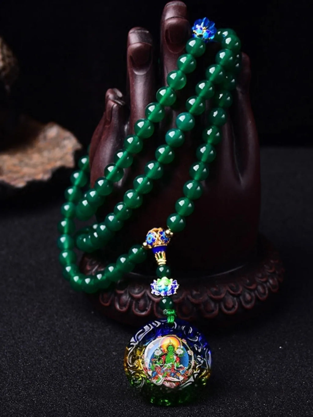 Natural green agate 108 bead bracelet with thangka pendant, worn as a multi-loop unisex accessory.