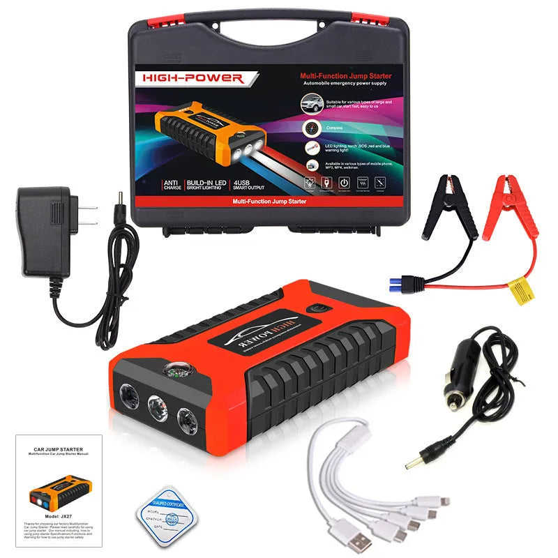 Red car emergency starter power bank 20000mAh with SOS light and USB output on a surface