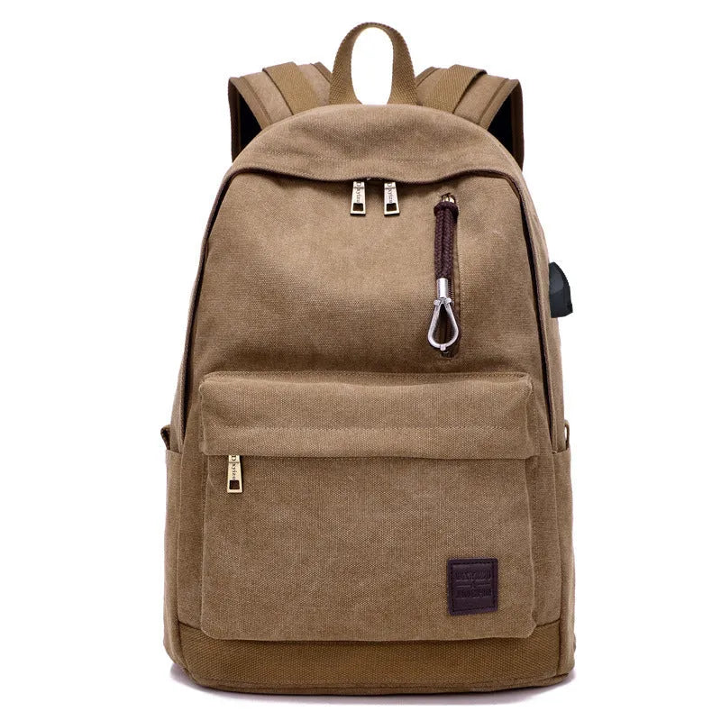 Canvas backpack with USB charging port and multiple compartments including separate laptop pocket