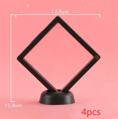 3D floating display case holding coins and jewellery between transparent membrane sheets