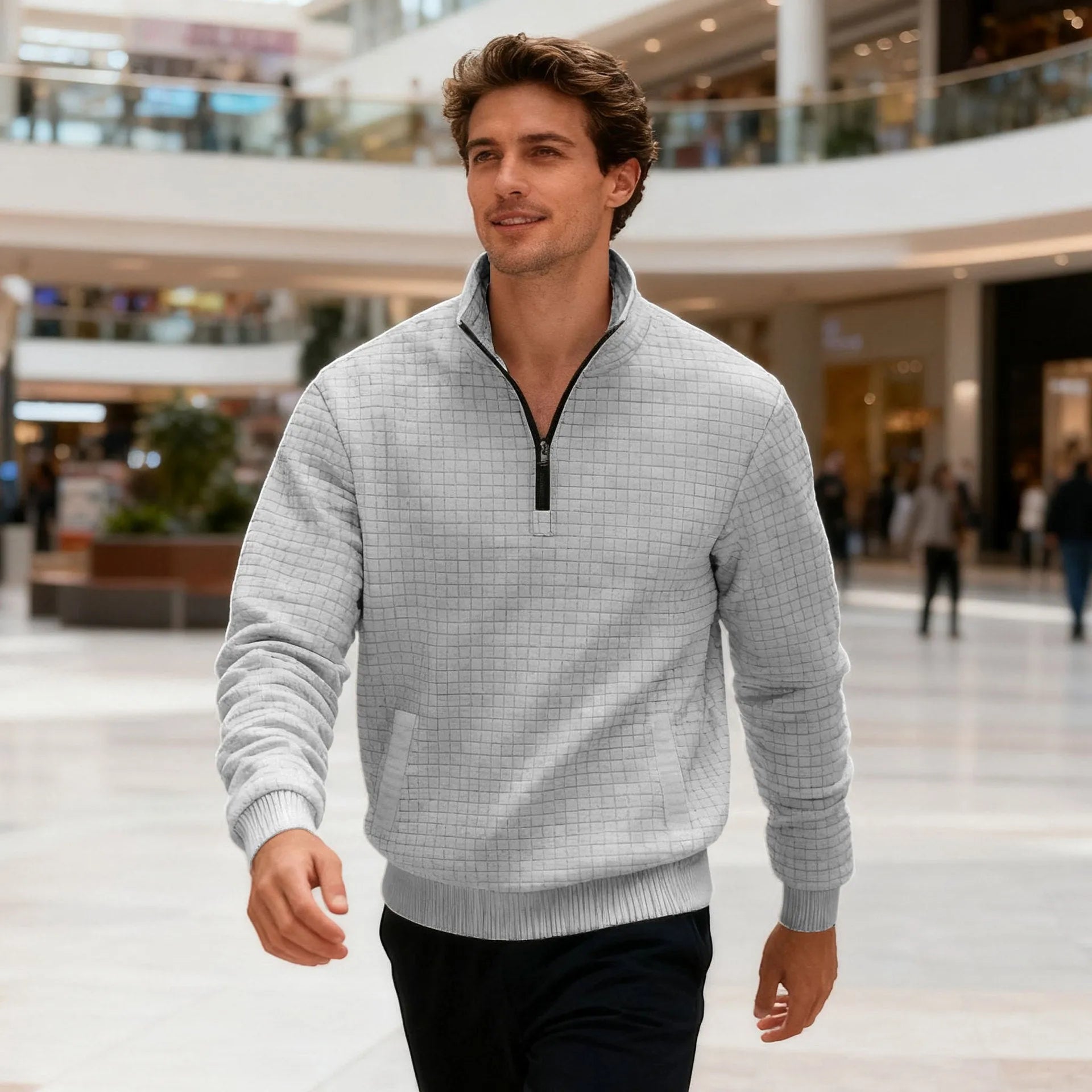 Men's stand-up collar jacquard small check sweatshirt with long sleeves and side pockets on a model