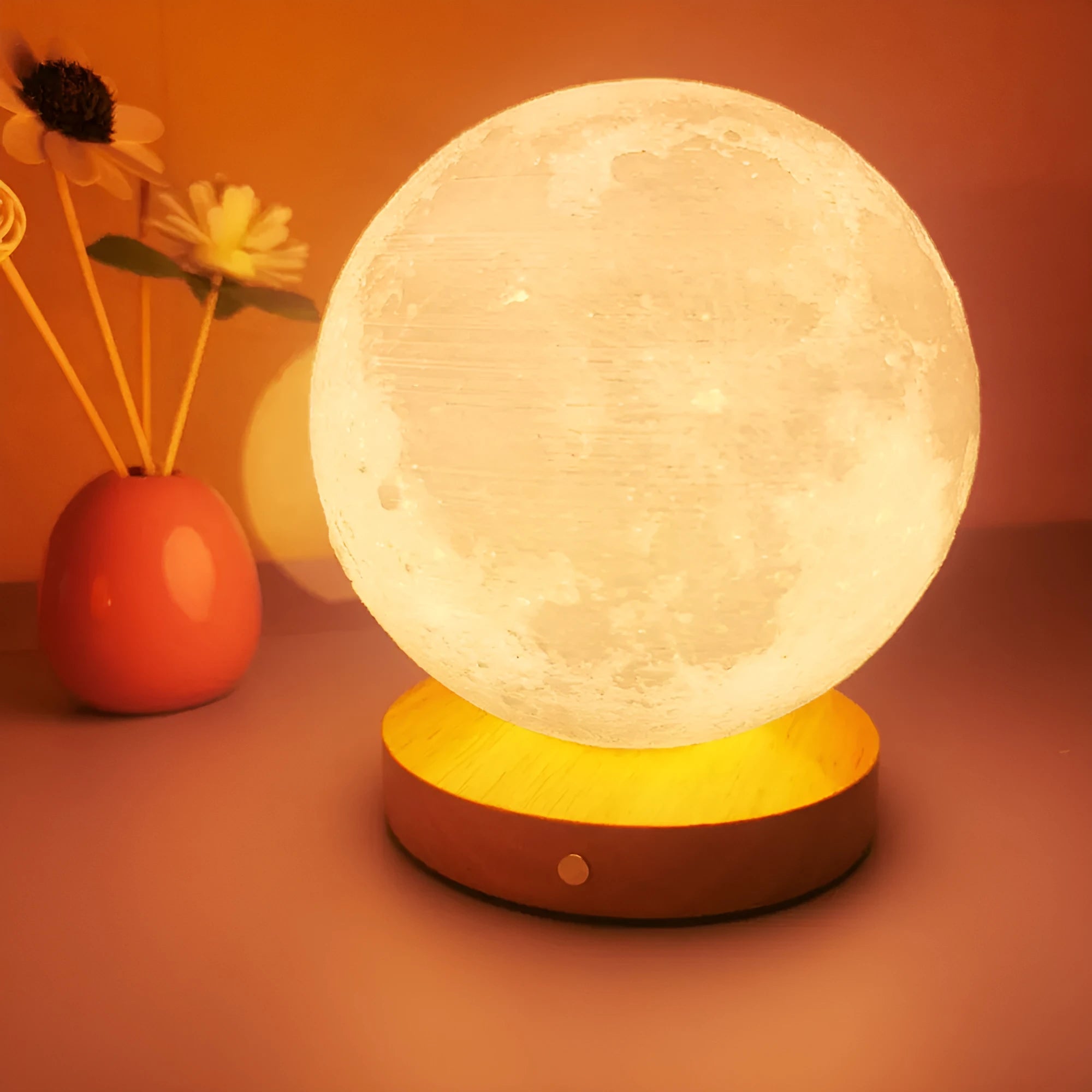 Rotating moon night lamp with wooden base showing three colour lighting options