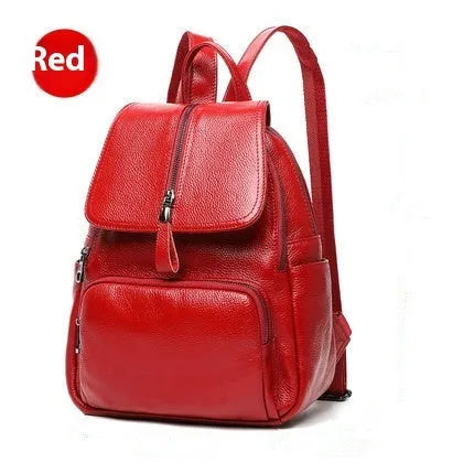 Genuine leather blue women's backpack showing front sandwich pocket and street trend design.