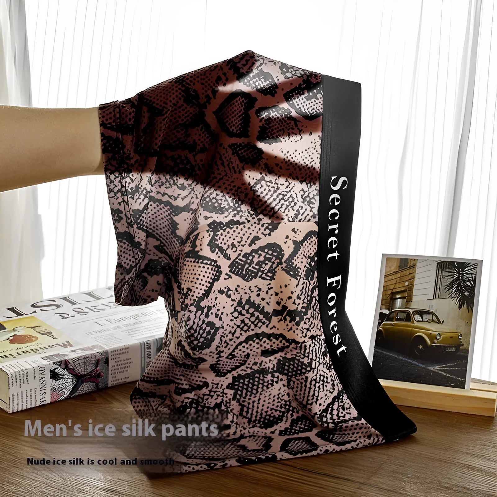 Men's loose fit thin boxer shorts in black, grey, and brown colours, made from quick-dry polyester.