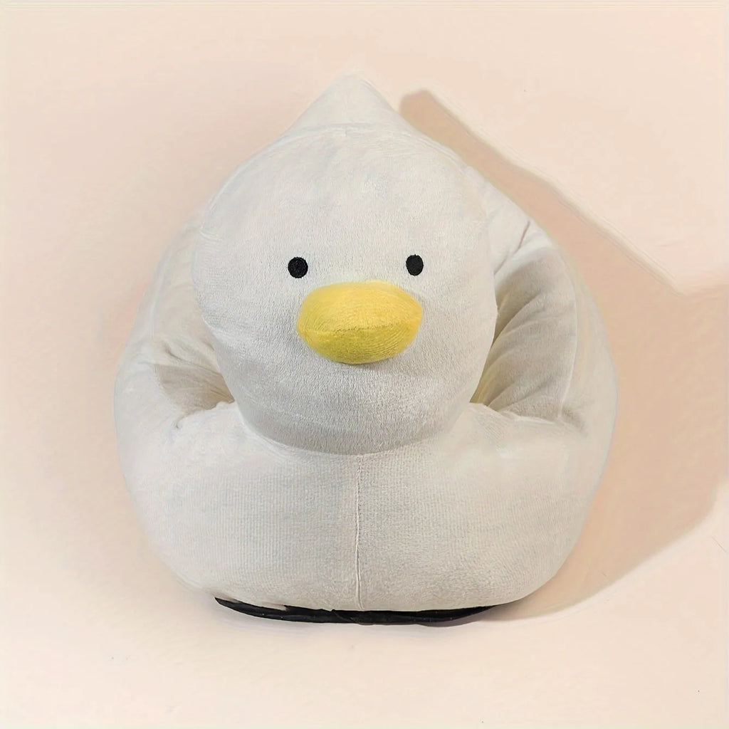 Blue duck-shaped fluffy pet bed for small dogs and cats on a wooden floor.