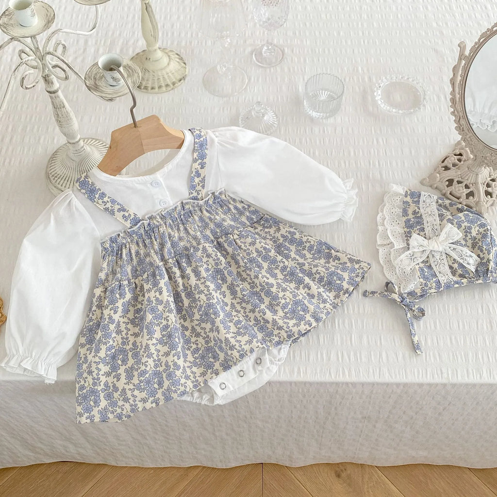 White cotton baby girl floral princess fake two triangle romper with removable hood, long sleeves, front view