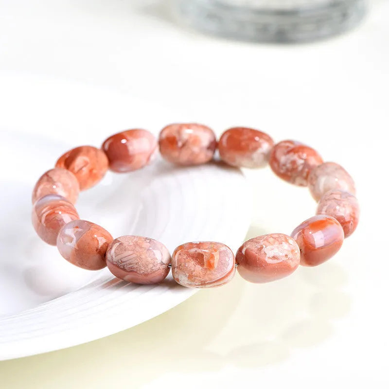 Natural cherry agate barrel shaped bead bracelet with 10x14mm geometry beads and Ruyi design elements