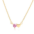 925 silver heart necklace with emerald zircon in gold finish on display