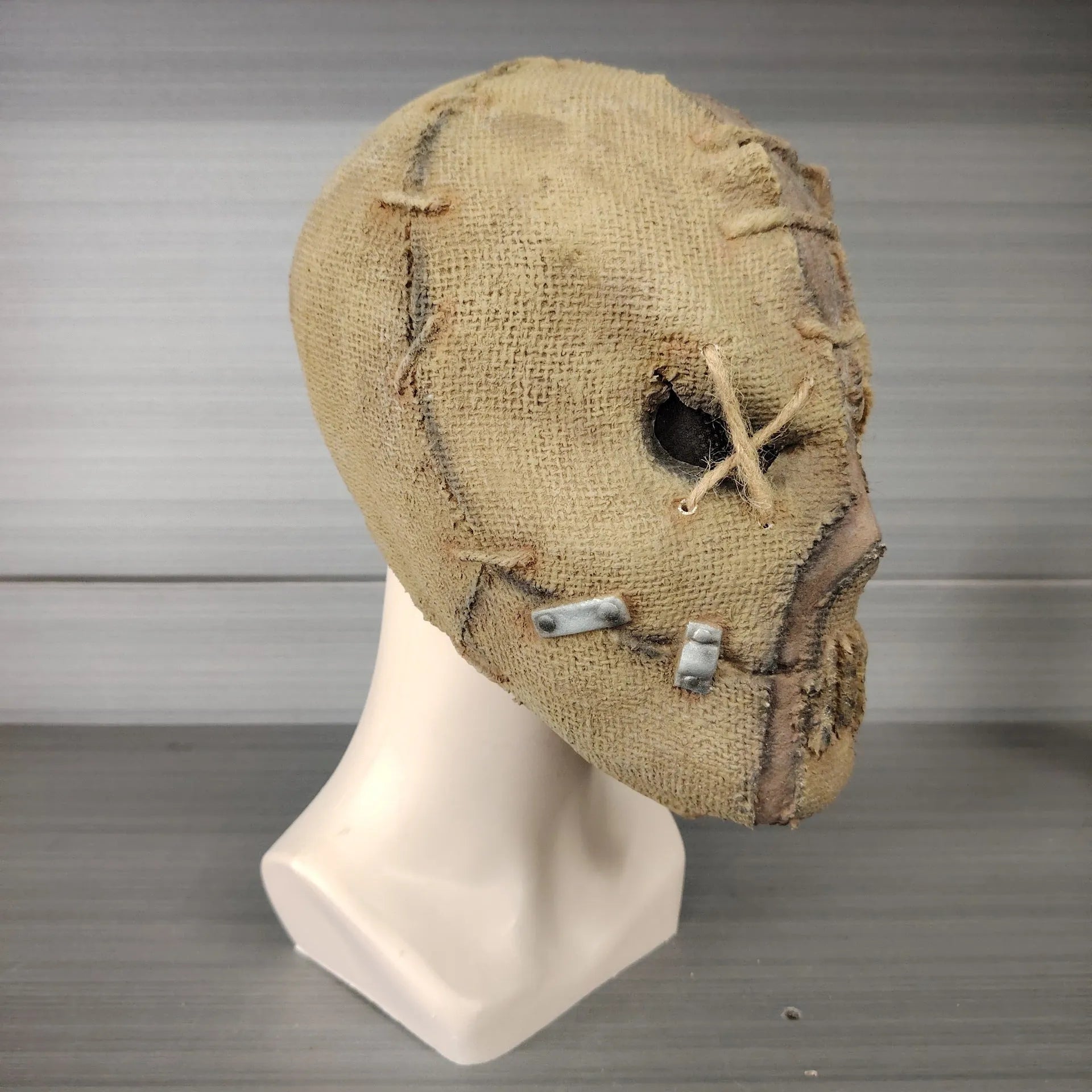 Scar skull design latex Halloween mask for adults measuring 31cm tall with horror styling