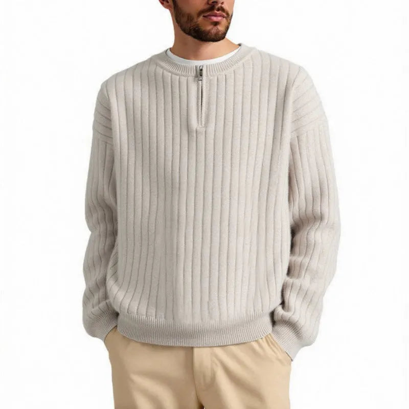 Men's grey half zip loose fit pullover sweater with textured knit on a hanger.