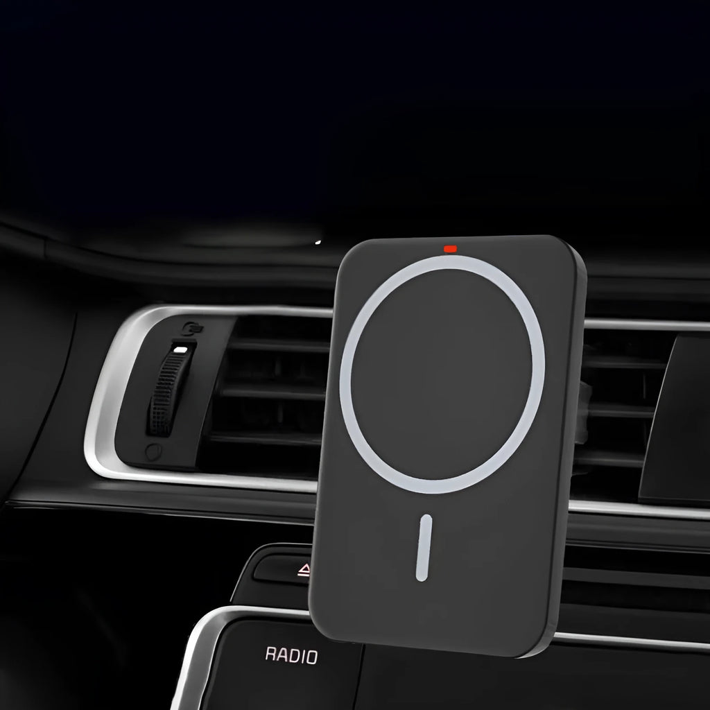 Black car magnetic wireless charger bracket mounted on car vent with phone attached